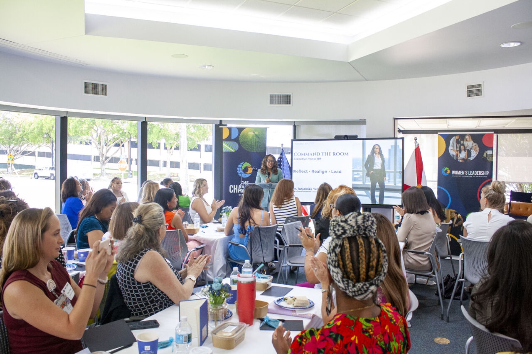 Dr. TL Coleman speaking to attendees at a Chamber of Commerce of the Palm Beaches event